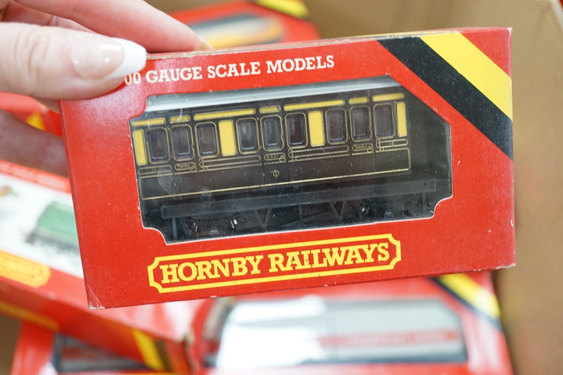 Thirty-six boxed Hornby railways 00 gauge items including five BR diesel locomotives; a Class 47 (R075), a Hymek (R074), a Class 25 (R068) and two Class 08 shunters (R156), together with fifteen freight wagons, twelve bo